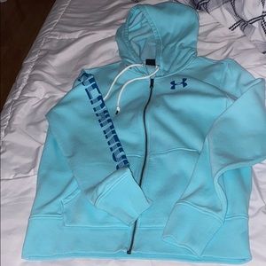 It’s a baby blue hoodie with a zipper.